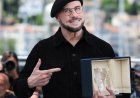Travolta Wore Berets at Cannes to ‘Play’ a Director — Cue Viral Reactions
