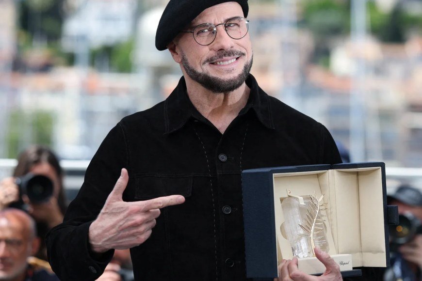 Travolta Wore Berets at Cannes to ‘Play’ a Director — Cue Viral Reactions